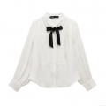 Women's Elegant White Tuxedo Shirt Long Sleeve Lapel Blouse Featuring Black Bow Decor and Vertical Pleats Sophisticated Button Up Top for Formal Office Party Wear
