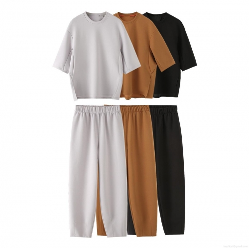 Women's Casual 2 Piece Set Minimalist Round Neck Drop Shoulder Half Sleeve T-Shirt and High Waist Elastic Long Pants Solid Color Loungewear Set