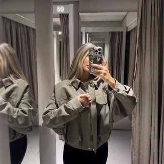 Women's Loose PU Leather Jacket Lapel Zipper Faux Leather Outerwear With Large Pockets Gathered Hem Solid Color Moto Jacket For Autumn Winter Streetwear